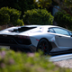 A Lamborghini Aventador Ultimae shows off design at a private lounge during Monterey Car Week 2022.